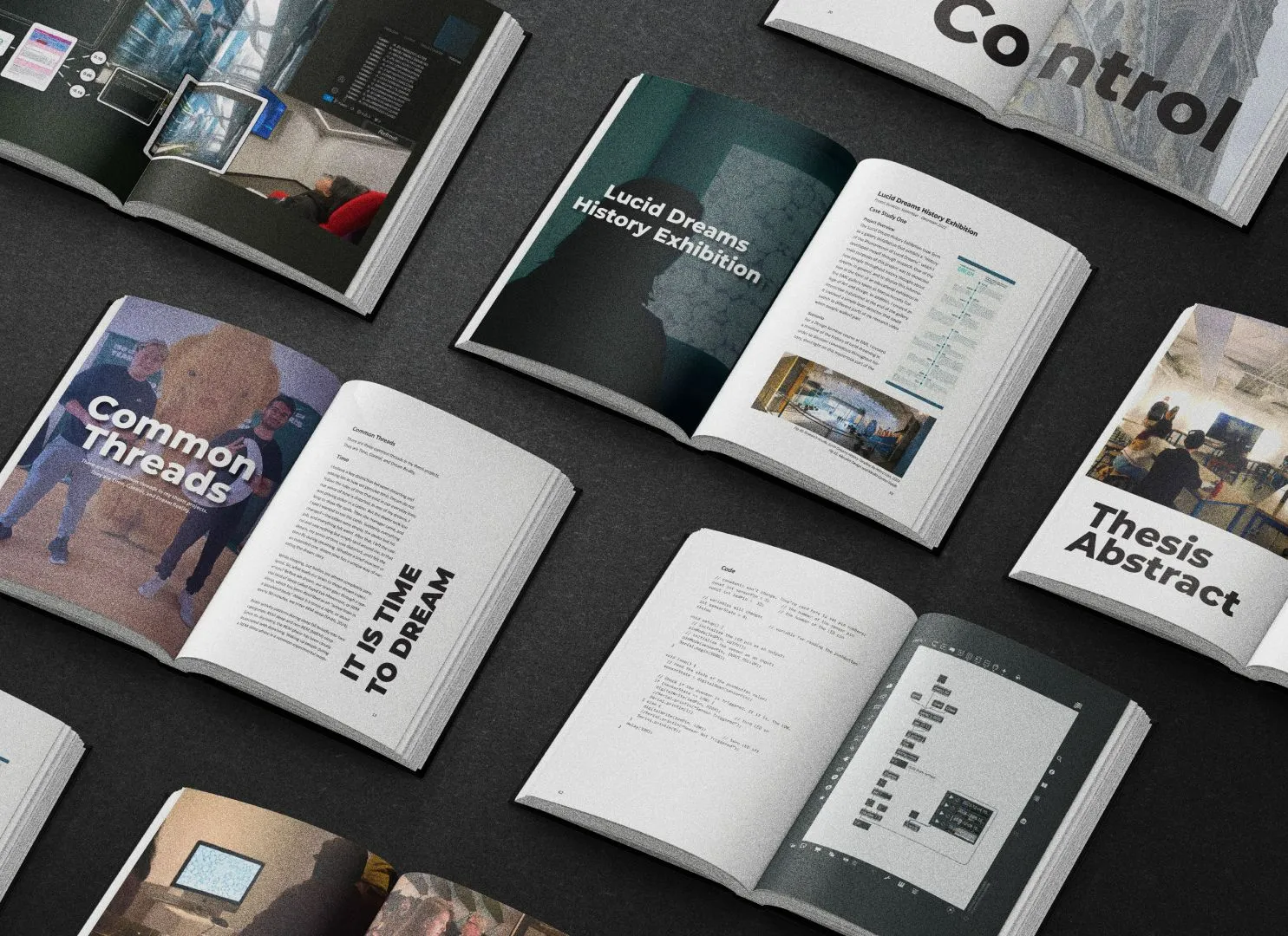 Dream Reality MFA Thesis Book — Top view of multiple copies